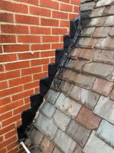Close up of chimney flashing repair