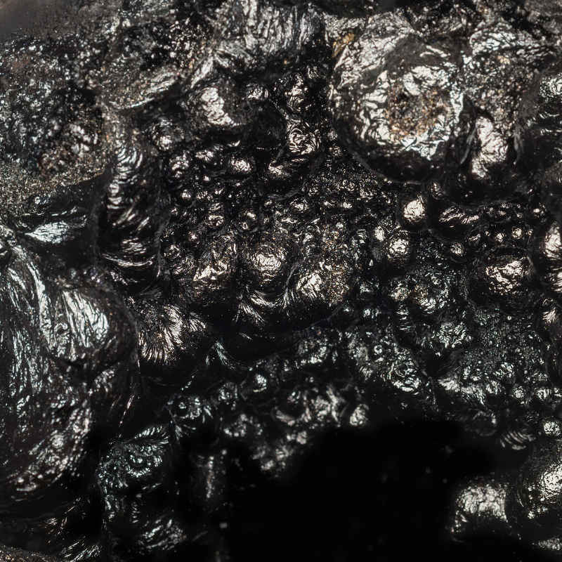 close up shot of dark, puffy creosote